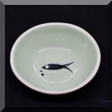 P51. Small signed ceramic bowl with fish on bottom. - $8 